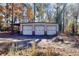 Three-car garage with covered carport at 10215 Alvin Rd, Alpharetta, GA 30022