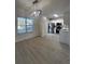 Modern dining room with kitchen views and hardwood floors at 137 St Ann Cir, Dallas, GA 30157