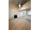 Open living room with vaulted ceiling, fireplace, and hardwood floors at 137 St Ann Cir, Dallas, GA 30157