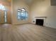 Spacious living room featuring hardwood floors and a fireplace at 137 St Ann Cir, Dallas, GA 30157
