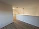 Upstairs hallway with light walls and wood-look flooring at 137 St Ann Cir, Dallas, GA 30157