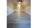 Spacious bedroom with double doors and wood-look flooring at 137 St Ann Cir, Dallas, GA 30157