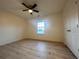 Well-lit bedroom with wood flooring and a ceiling fan at 137 St Ann Cir, Dallas, GA 30157