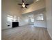 Bright living room with vaulted ceiling, fireplace, and hardwood floors at 137 St Ann Cir, Dallas, GA 30157