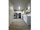 Modern kitchen with stainless steel appliances and white cabinets at 137 St Ann Cir, Dallas, GA 30157