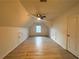Bright bonus room with wood flooring and ceiling fan at 137 St Ann Cir, Dallas, GA 30157