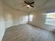 Spacious bedroom with light-colored flooring and large windows at 137 St Ann Cir, Dallas, GA 30157