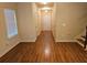 Light and airy entryway with wood-look floors at 363 Lobdale Falls Dr, Lawrenceville, GA 30045