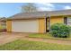 Attached garage with a white door at 1187 Dixie Rd, Covington, GA 30014