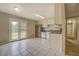 Kitchen boasts stainless steel appliances and French doors at 1187 Dixie Rd, Covington, GA 30014