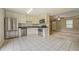 Kitchen with stainless steel appliances and tile flooring at 1187 Dixie Rd, Covington, GA 30014