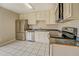 Galley style kitchen with stainless steel appliances at 1187 Dixie Rd, Covington, GA 30014