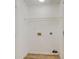 Small laundry room with wire shelving and linoleum floor at 1187 Dixie Rd, Covington, GA 30014