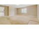 Large living area with access to kitchen and hallway at 1187 Dixie Rd, Covington, GA 30014