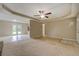 Open living room with access to kitchen and backyard at 1187 Dixie Rd, Covington, GA 30014
