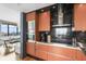 Modern kitchen with stainless steel appliances and wood cabinets at 75 14Th Ne St # 3560, Atlanta, GA 30309