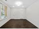 Bright bedroom with hardwood floors, neutral walls, and a window with curtains at 962 Rittenhouse Way, Atlanta, GA 30316