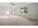 Main bedroom with ceiling fan and ample natural light at 962 Rittenhouse Way, Atlanta, GA 30316