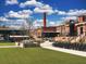 Renovated park with artificial turf and brick walkways at 176 Railroad St, Canton, GA 30114