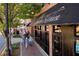 Downtown restaurant with outdoor seating and people walking by at 172 Railroad St, Canton, GA 30114