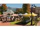 Farmers market in the town square with various vendors at 172 Railroad St, Canton, GA 30114