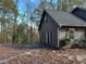 Side view of house, showing gray siding and yard at 4045 Egypt Rd, Snellville, GA 30039