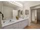 Double vanity bathroom with large mirror, soaking tub and separate shower at 5356 Brooke Ridge Dr, Dunwoody, GA 30338