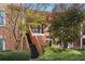 Townhome with brick staircase and lush landscaping at 5356 Brooke Ridge Dr, Dunwoody, GA 30338