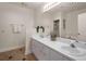 Double vanity bathroom with large mirror, soaking tub and separate shower at 5356 Brooke Ridge Dr, Dunwoody, GA 30338