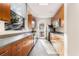 Community kitchen with modern appliances and access to outdoor grilling area at 3300 Windy Ridge Se Pkwy # 718, Atlanta, GA 30339