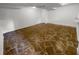 Unfinished basement with flagstone flooring at 5876 Poplin Ct, Lithonia, GA 30058