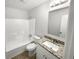 Clean bathroom, granite countertop, and bathtub at 5876 Poplin Ct, Lithonia, GA 30058