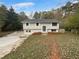 Updated ranch home with fresh paint and landscaping at 5876 Poplin Ct, Lithonia, GA 30058