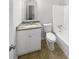 Bathroom with white vanity, granite countertop, and bathtub at 5876 Poplin Ct, Lithonia, GA 30058