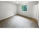Well-lit bedroom with neutral wall paint and carpet at 5876 Poplin Ct, Lithonia, GA 30058