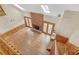 Gathering room with hardwood floors, brick fireplace, and skylights at 2545 Winthrope Way, Lawrenceville, GA 30044