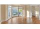 Bright living room with hardwood floors, bay window, and access to other rooms at 2545 Winthrope Way, Lawrenceville, GA 30044