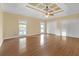 Large main bedroom with hardwood floors and high ceilings at 2545 Winthrope Way, Lawrenceville, GA 30044