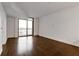 Spacious living room with hardwood floors and large window at 270 17Th Nw St # 1108, Atlanta, GA 30363