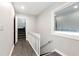 Interior view of a stairwell leading to the upper level at 9154 Branch Valley Way, Roswell, GA 30076