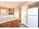 Kitchen with granite countertops and wood cabinets at 6315 Wellington Walk Way, Lithonia, GA 30058