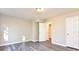 Bright bedroom with grey flooring and double closets at 6315 Wellington Walk Way, Lithonia, GA 30058