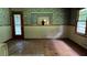 Dining room with hardwood floors and dated wallpaper at 539 Lynhurst Sw Dr, Atlanta, GA 30311
