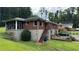 Side of brick ranch house with screened porch and stairs at 539 Lynhurst Sw Dr, Atlanta, GA 30311
