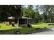 Brick ranch house with screened porch and wooded backyard at 539 Lynhurst Sw Dr, Atlanta, GA 30311