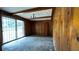 Features wood paneled walls and sliding glass doors at 539 Lynhurst Sw Dr, Atlanta, GA 30311