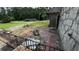 Small patio with brick and stone flooring needing work at 539 Lynhurst Sw Dr, Atlanta, GA 30311