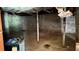 Unfinished basement with stone walls and concrete floor at 539 Lynhurst Sw Dr, Atlanta, GA 30311
