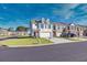 Townhome community with well-maintained landscaping at 2615 Quarterdeck Dr, Cumming, GA 30041