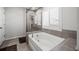 Spa-like bathroom with soaking tub and walk-in shower at 2615 Quarterdeck Dr, Cumming, GA 30041
